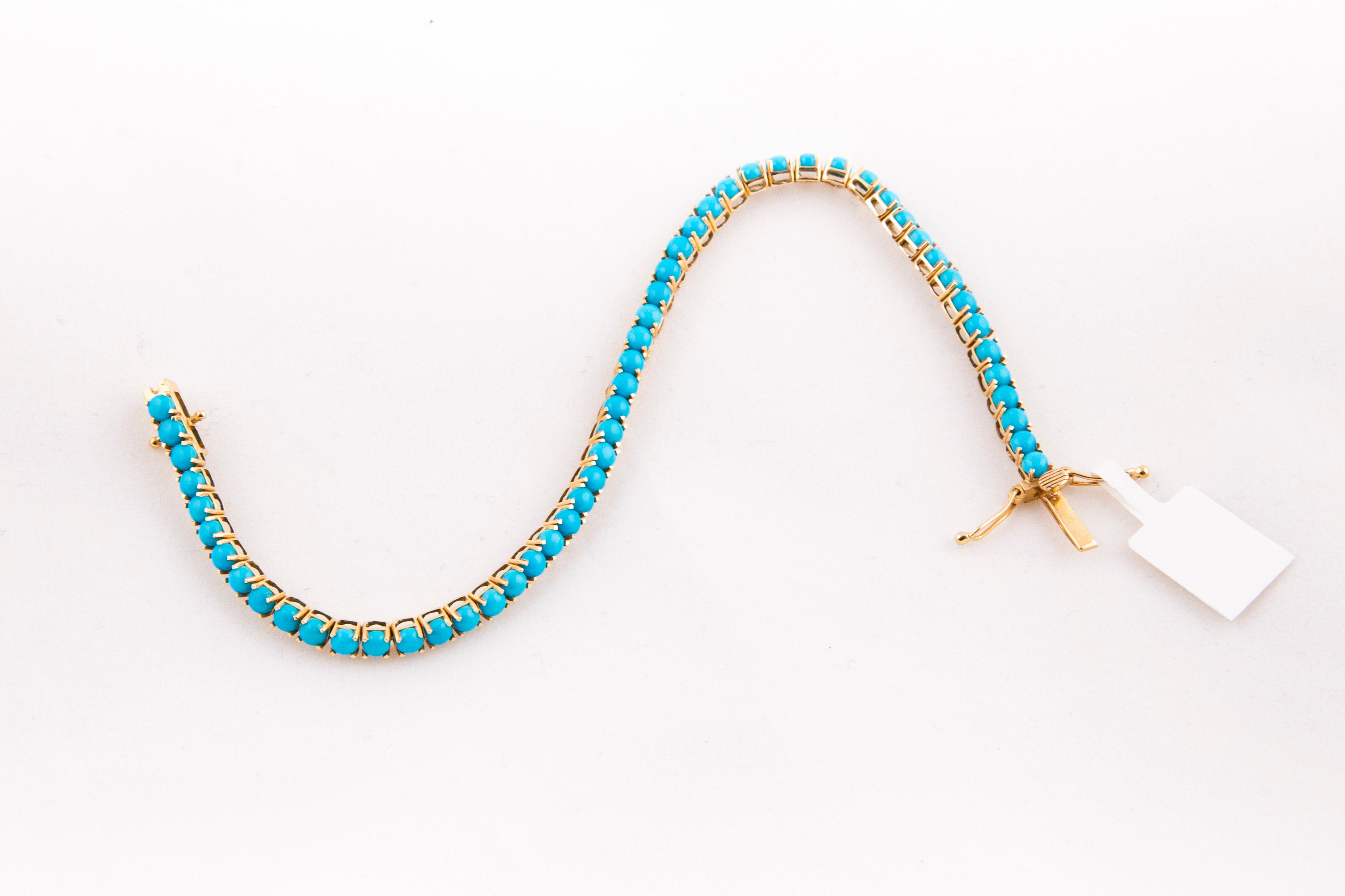 Pulsera Tennis Turquesa Oro Amarillo 14K 6.25 ct.