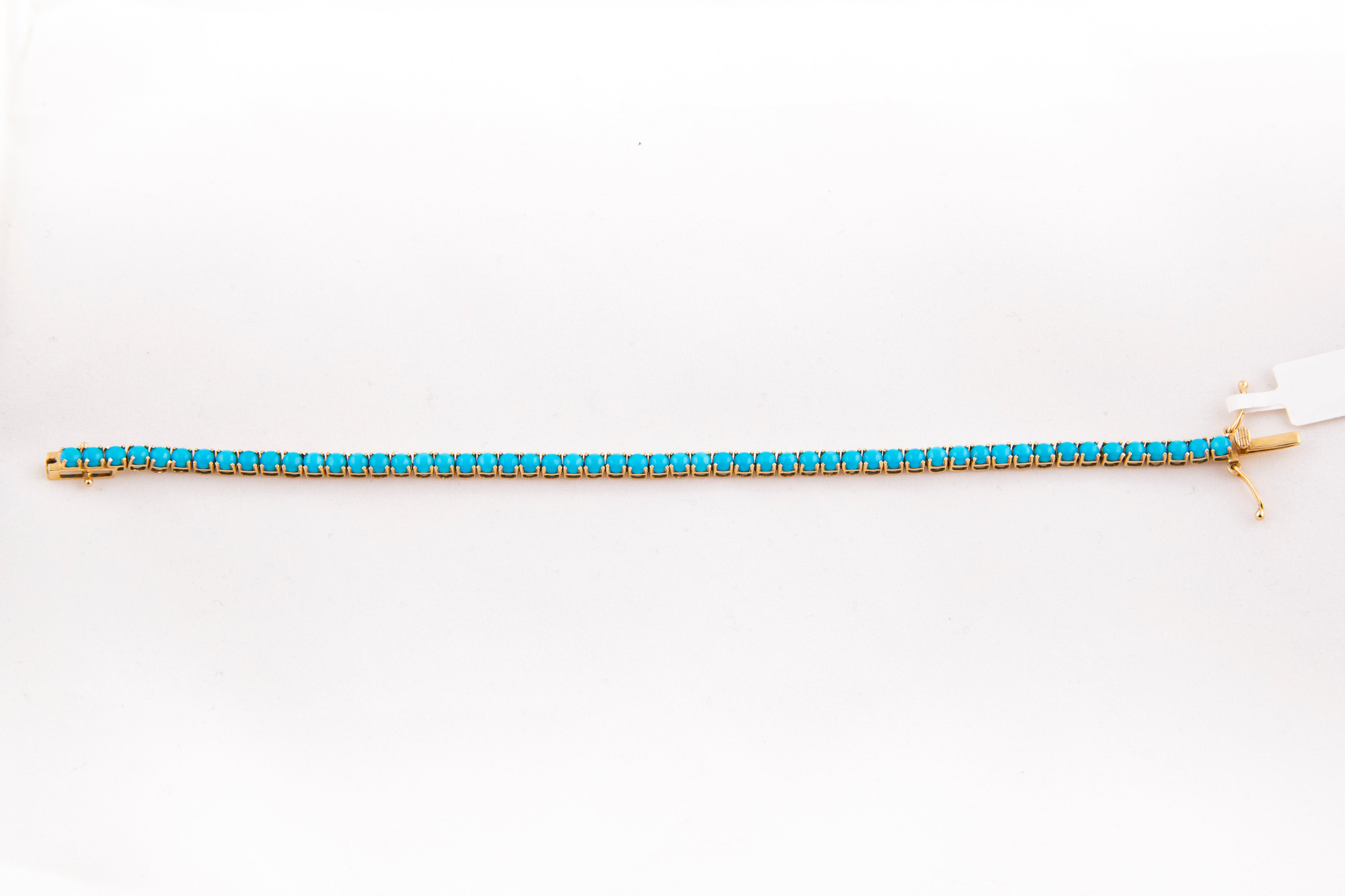 Pulsera Tennis Turquesa Oro Amarillo 14K 6.25 ct.