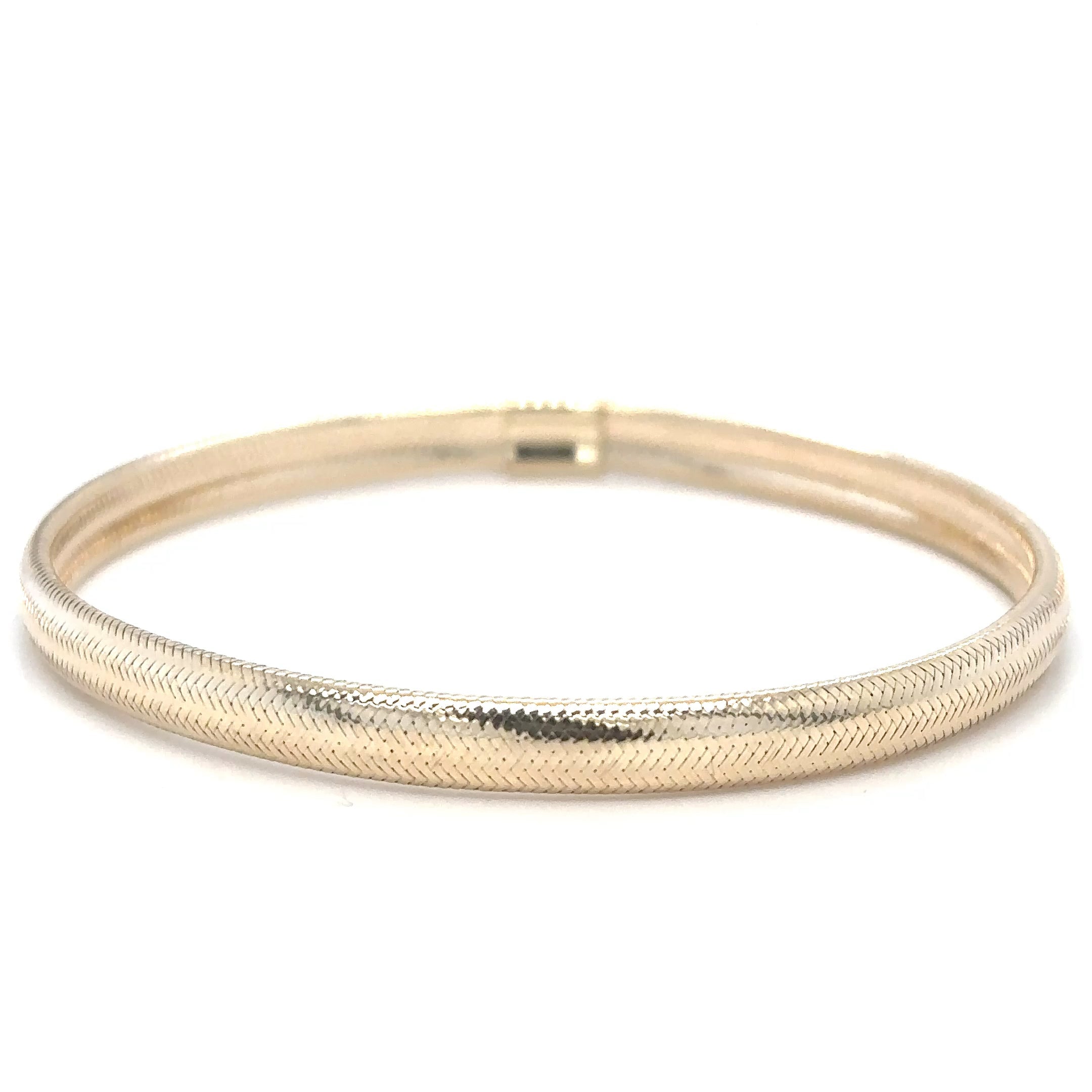 Brazalete Elástico De Oro Amarillo De 14 K  TCW.