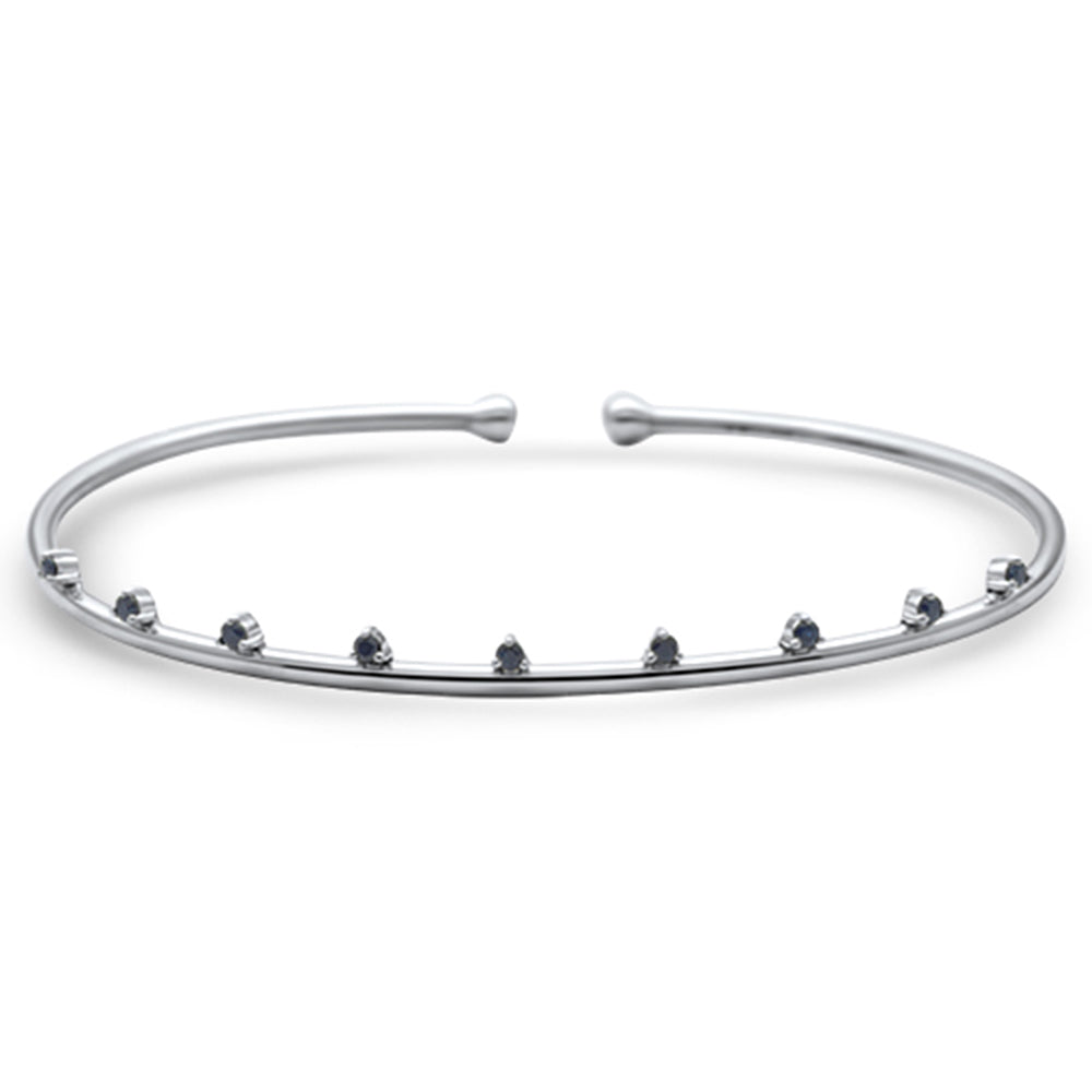 Open bracelet with blue sapphire in 14K white gold, 56 mm, 0.2CT.