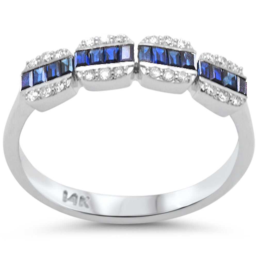 14K white gold ring with diamonds and 0.46CT baguette-shaped blue sapphire.