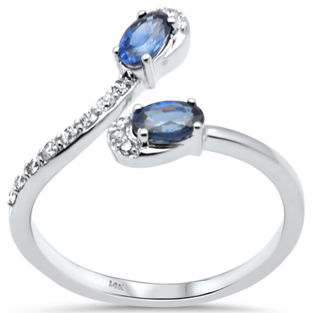 Open band ring with blue sapphire and diamonds in 14K white gold, 0.76CT.